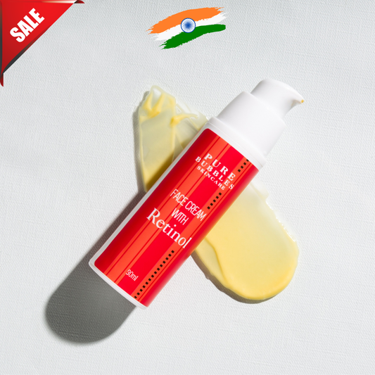 Red bottle of face cream with retinol on a white background, with a sale banner and Indian flag in the corner.