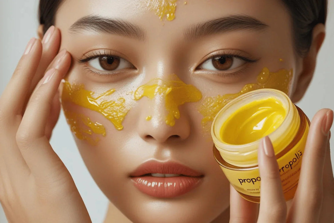 Woman applying golden propolis face mask for glowing, sensitive skin care routine